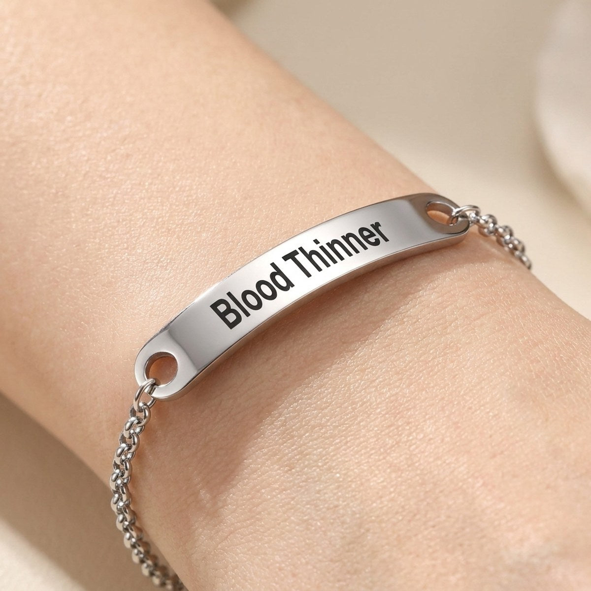 Cynora medical ID bracelet: engraved Blood Thinner steel bar on the wrist