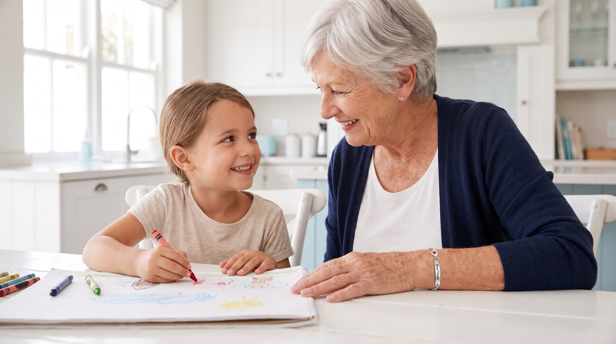 Grandmother drawing with her granddaughter while wearing her medical ID bracelet